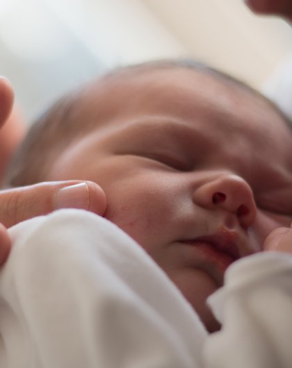 In dads arms - New Born photography